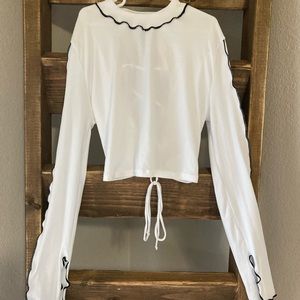 Cropped long sleeve top
